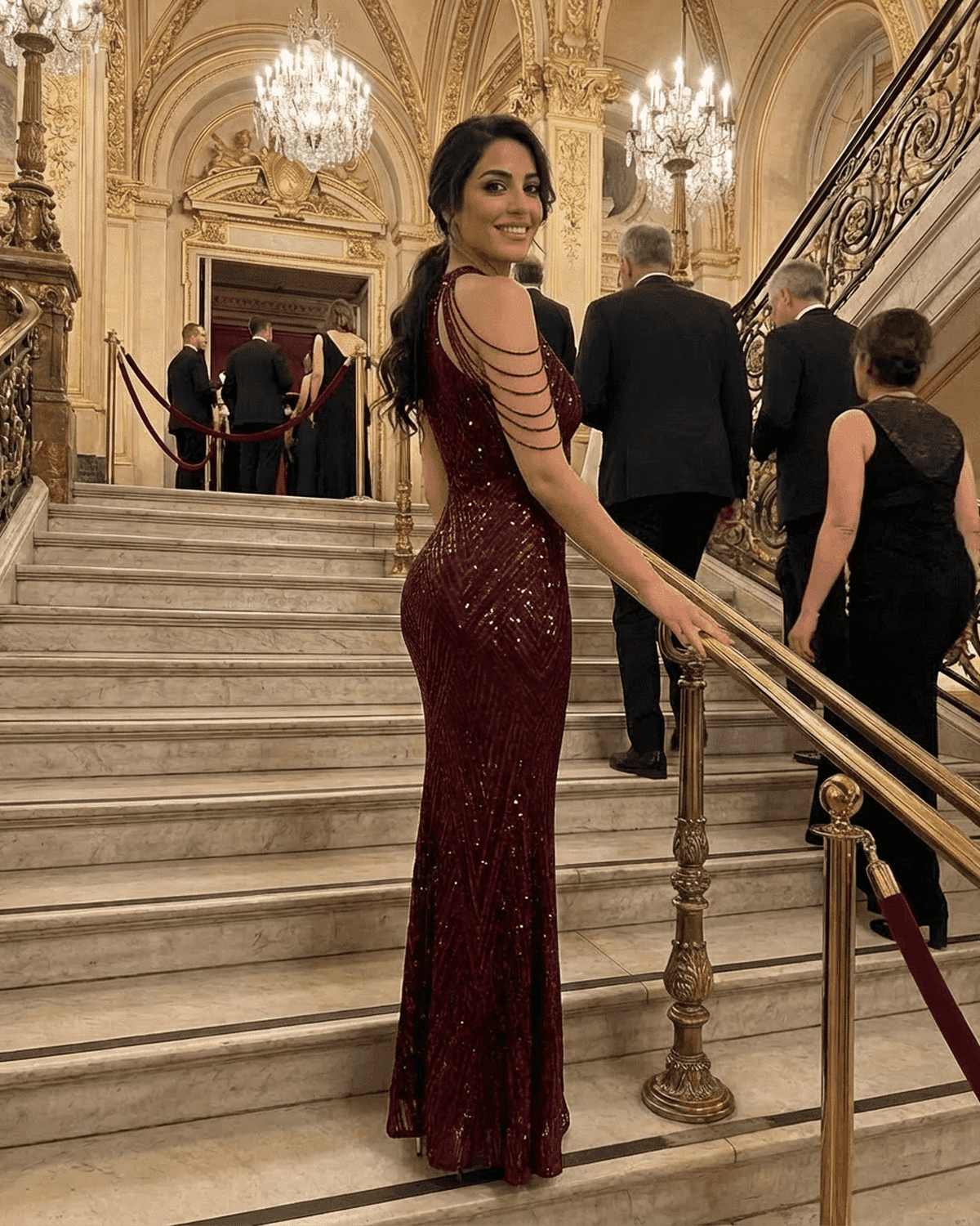 Ruby Maxi Dress featured in glamorous setting with elegant halter design and sequins.