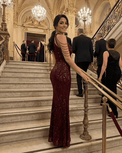Indie Maxi Dress from RAMBLION featuring a luxurious deep red hue, perfect for upscale events, exuding sophistication.
