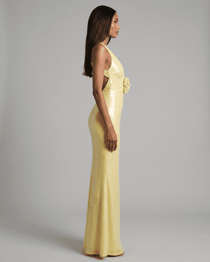 Solara Maxi Dress by RAMBLION in yellow with backless V-neck silhouette and floral sequin detail.