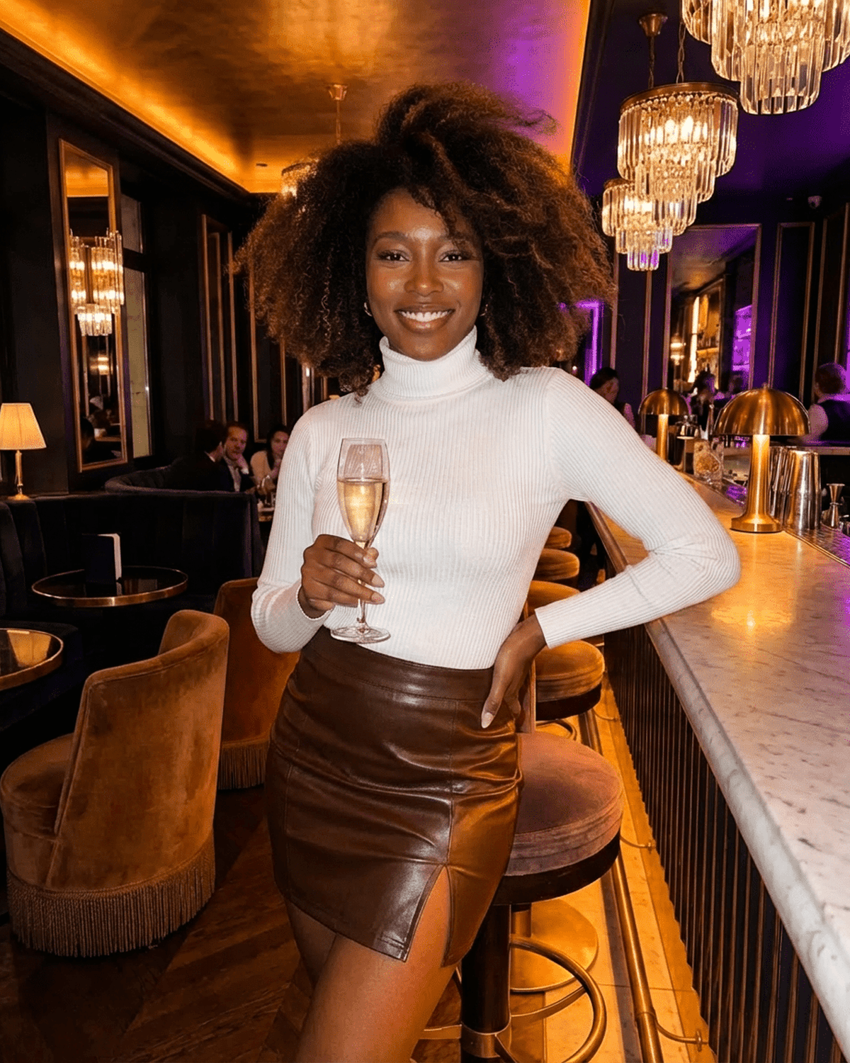 Umbria Mini Skirt by RAMBLION showcased by a model in a stylish setting, featuring a high-waisted PU A-Line design.