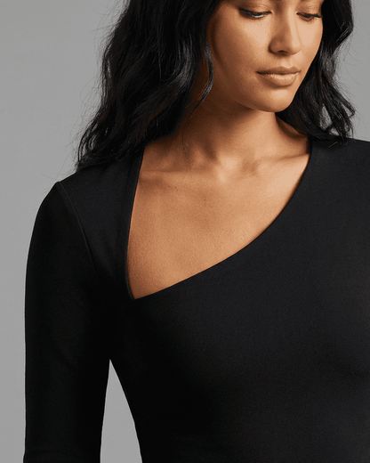 Vega Midi Dress by RAMBLION, showcasing a stylish one-shoulder design and smooth knit fabric for a flattering fit.