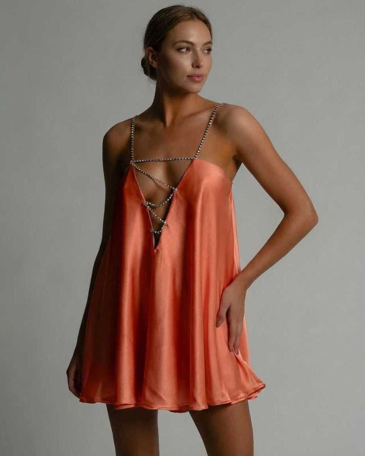 Leoa Mini Dress in vibrant orange satin with A-line silhouette, perfect for stylish occasions by RAMBLION.