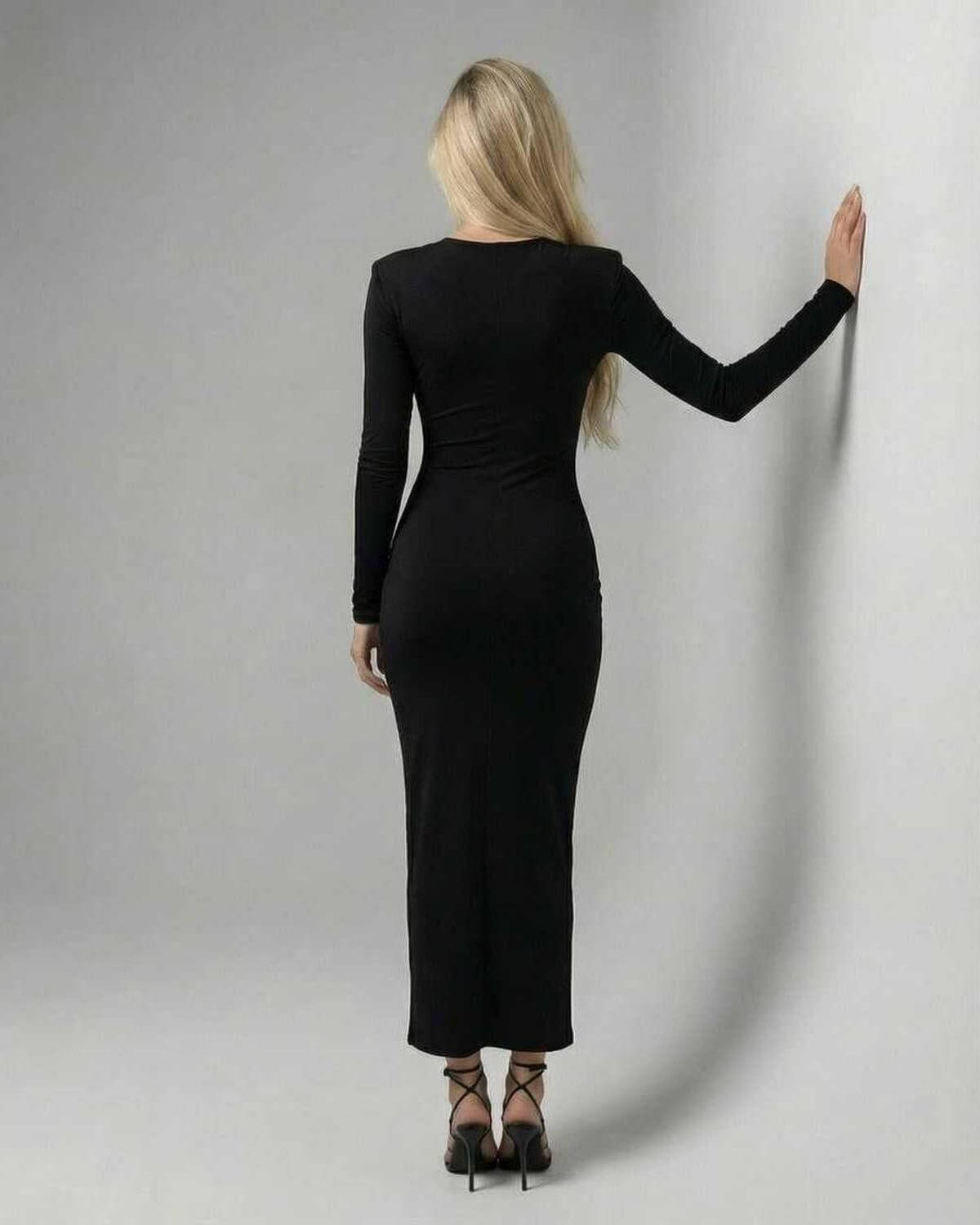 Levanzo Midi Dress in black, showcasing elegant silhouette, V neckline, perfect for modern occasions, by RAMBLION.