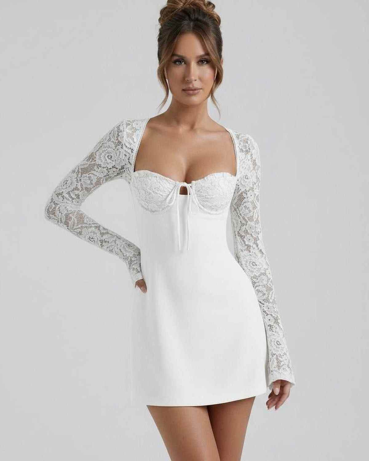 Lia Mini Dress by RAMBLION, featuring elegant lace sleeves and structured bust, perfect for modern femininity and special occasions.