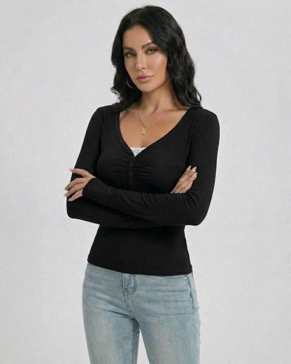 Linn Pullover by RAMBLION, black V-neck long sleeve, lightweight, chic silhouette, perfect for casual or elegant outings.