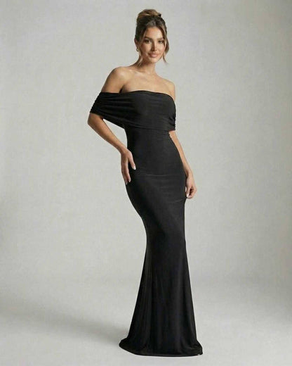 Lips Maxi Dress featuring off-shoulder style, ruched detailing, elegant black satin, perfect for evening occasions by RAMBLION.