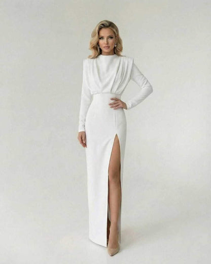 Lira Maxi Dress, elegant white ankle-length dress, O-neck, long sleeves by RAMBLION, perfect for special occasions.