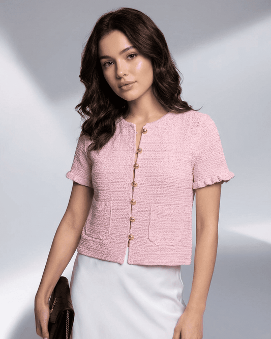 Liri Cardigan by RAMBLION, pink knit with short sleeves, perfect for warm days and casual occasions.