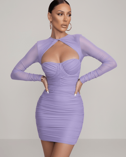 Liro Mini Dress by RAMBLION in lavender, featuring sheer long sleeves, ruched bodice, perfect for elegant occasions.