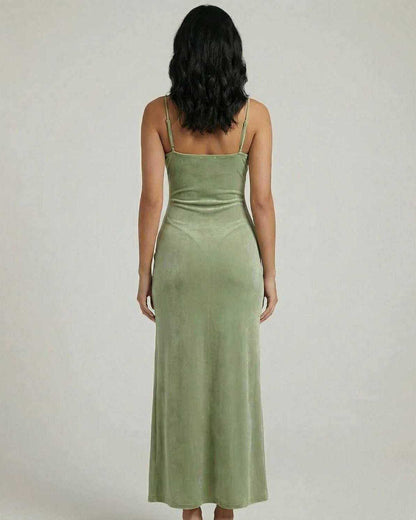 Back view of Lixa Midi Dress in green, featuring a square neck, sleek silhouette, and side slit, by RAMBLION.