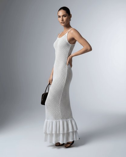 Loba Maxi Dress in white, ankle-length cotton blend with hollow knit texture, perfect for summer occasions, by RAMBLION.