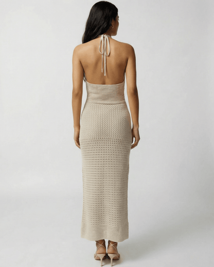Back view of Lova Maxi Dress in beige with halter neck, perfect for warm weather outings - RAMBLION.