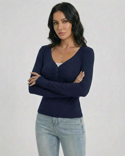 Luce Pullover featuring a V-neck, soft fabric, and elegant design from RAMBLION, perfect for casual or sophisticated occasions.