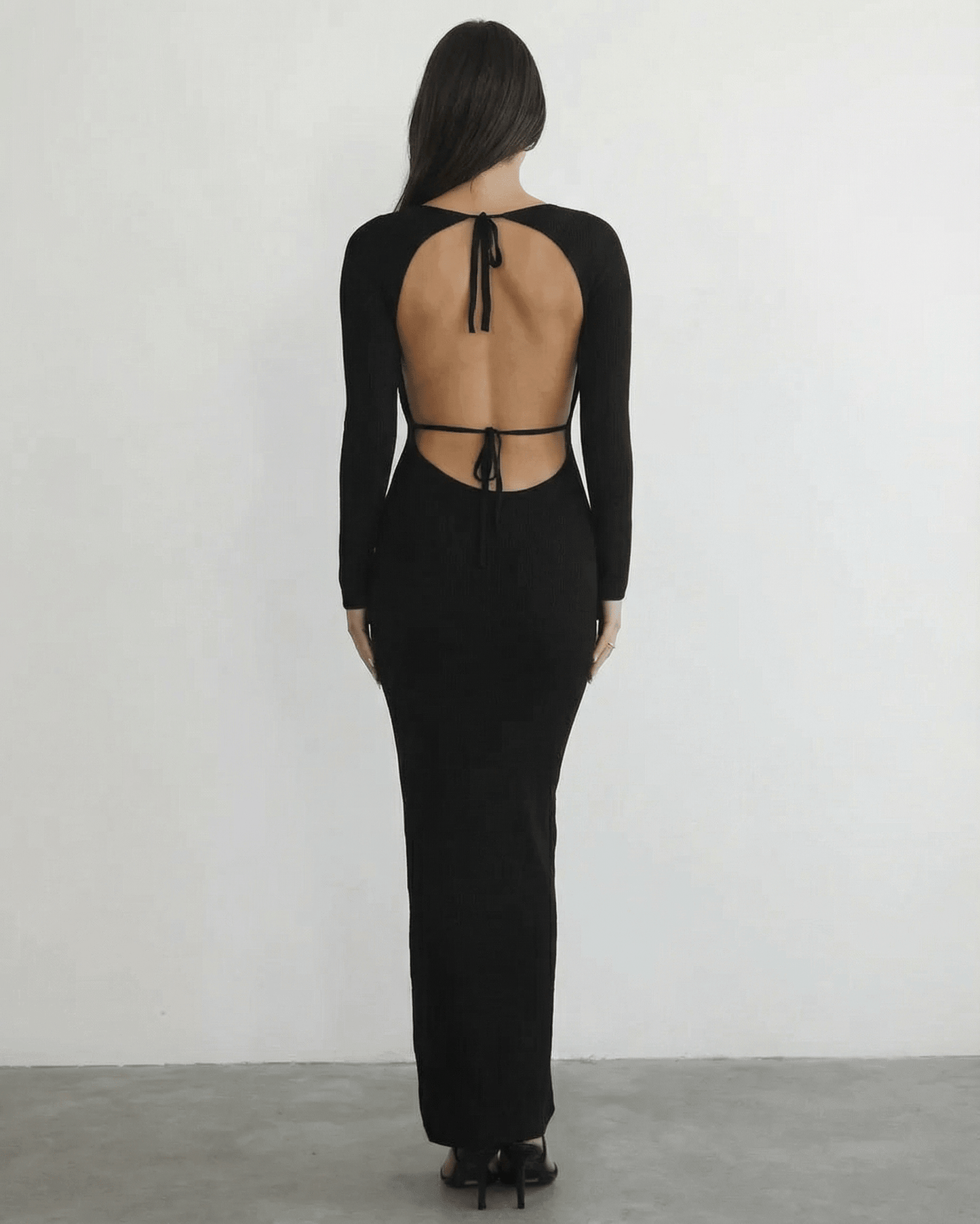 Luma Maxi Dress back view showcasing black ankle-length design, elegant open back, perfect for versatile occasions, by RAMBLION.