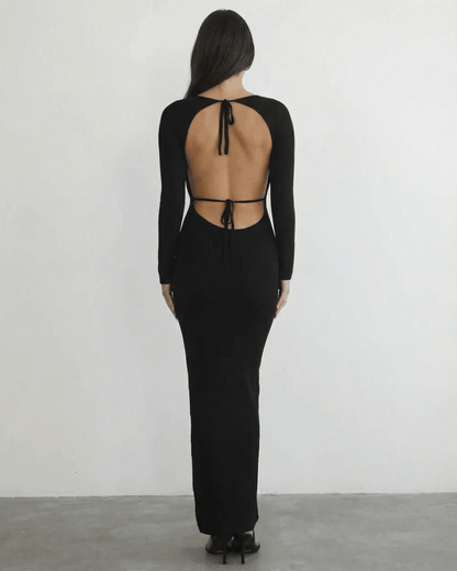 Luma Maxi Dress back view showcasing black ankle-length design, elegant open back, perfect for versatile occasions, by RAMBLION.