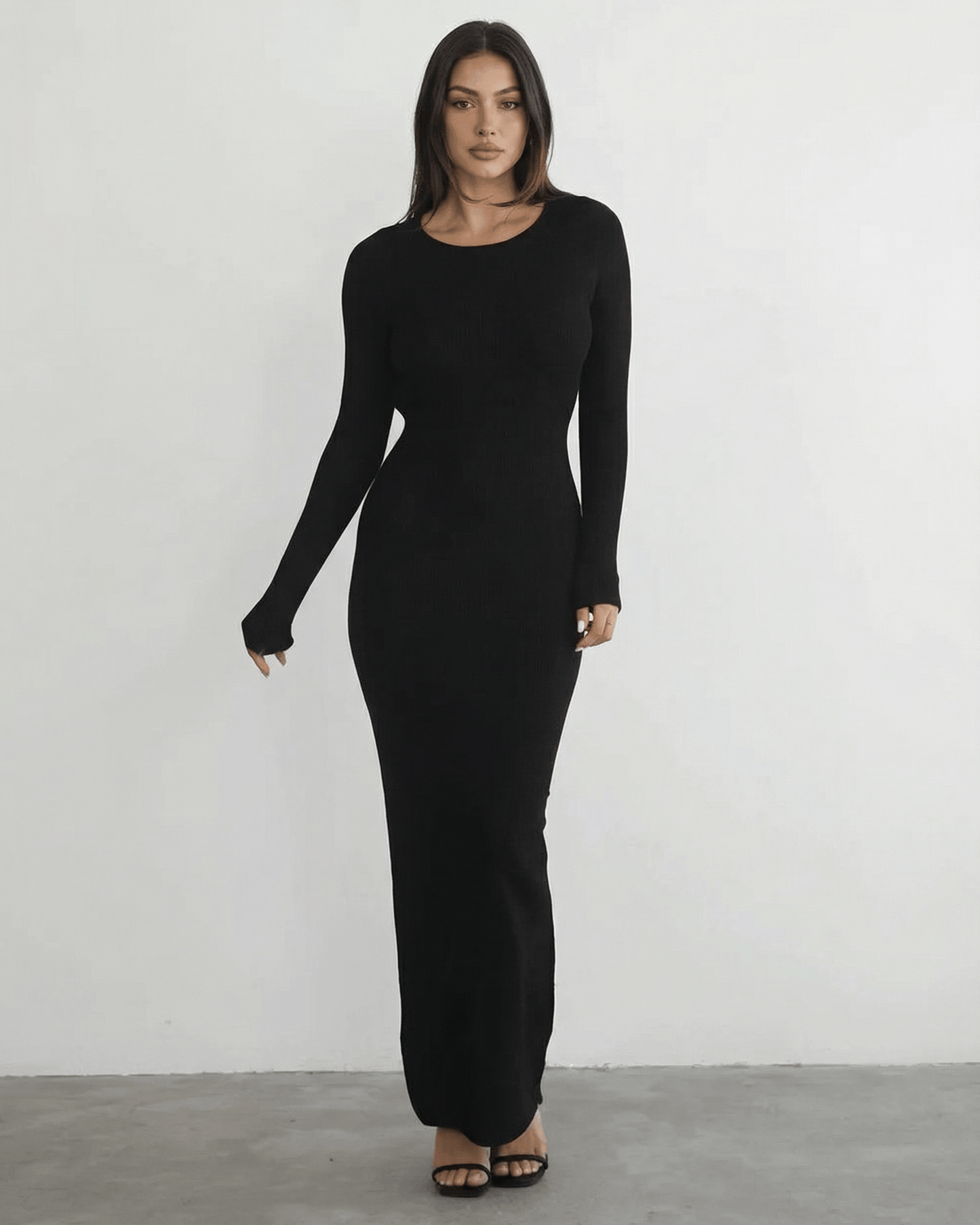 Luma Maxi Dress: Black ankle-length, round neck, modern silhouette from RAMBLION for chic occasions.