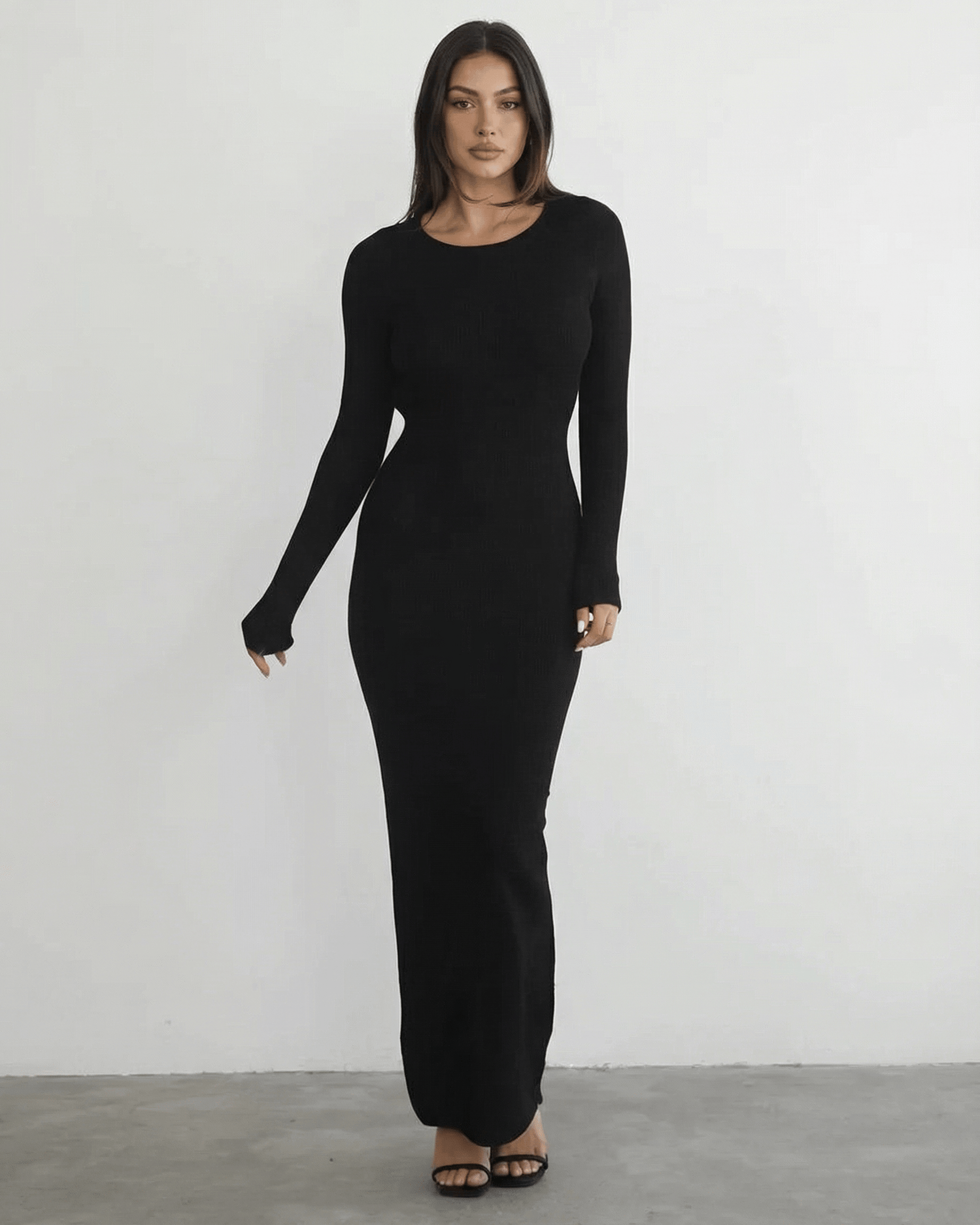Luma Maxi Dress: Black ankle-length, round neck, modern silhouette from RAMBLION for chic occasions.