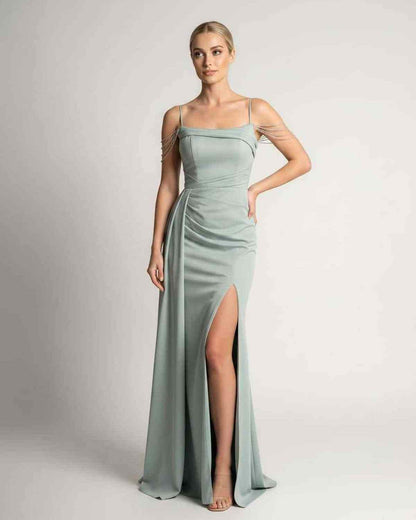Ramblion Lume maxi dress — spaghetti-strap neckline · back view · styled for prom season