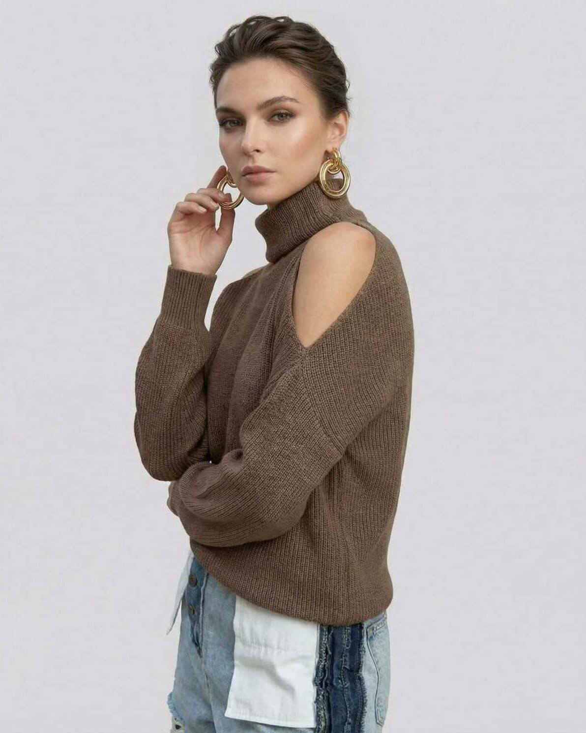 Lurex Sweater from RAMBLION featuring cutout shoulders, modern turtleneck, relaxed fit, stylish for casual outings.