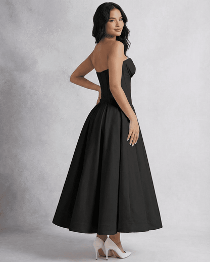 Macu Midi Dress featuring a strapless design, A-line silhouette, and luxurious black color by RAMBLION, perfect for special occasions.