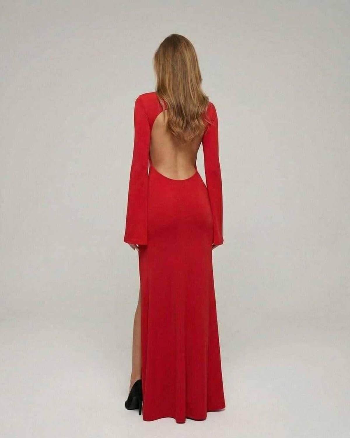 Back view of the Made Maxi Dress in bold red, featuring a stylish cut, perfect for sophisticated events by RAMBLION.
