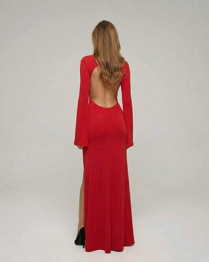 Back view of the Made Maxi Dress in bold red, featuring a stylish cut, perfect for sophisticated events by RAMBLION.