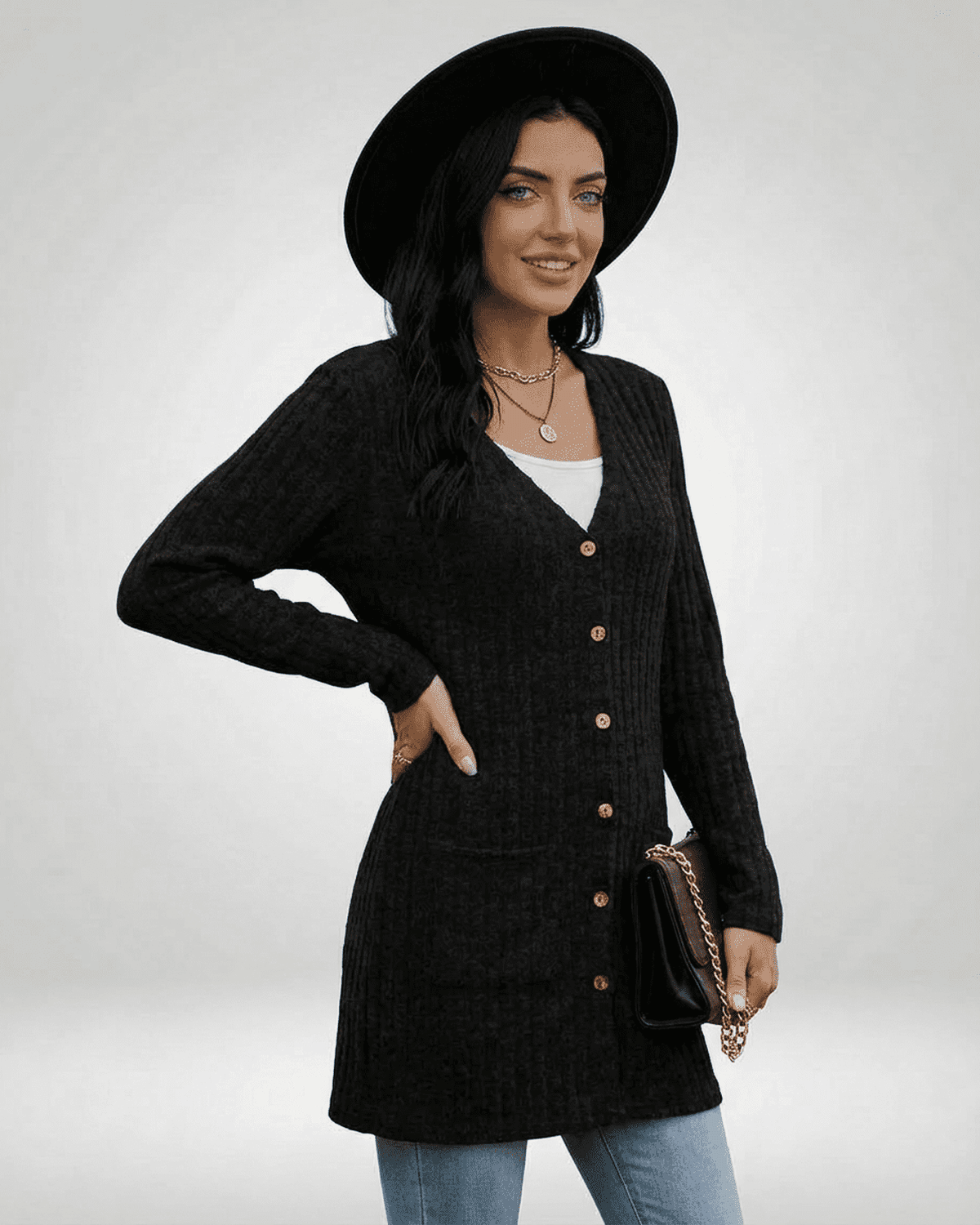 Madu Cardigan by RAMBLION, black knitwear with V-neck, versatile layering piece for casual occasions.