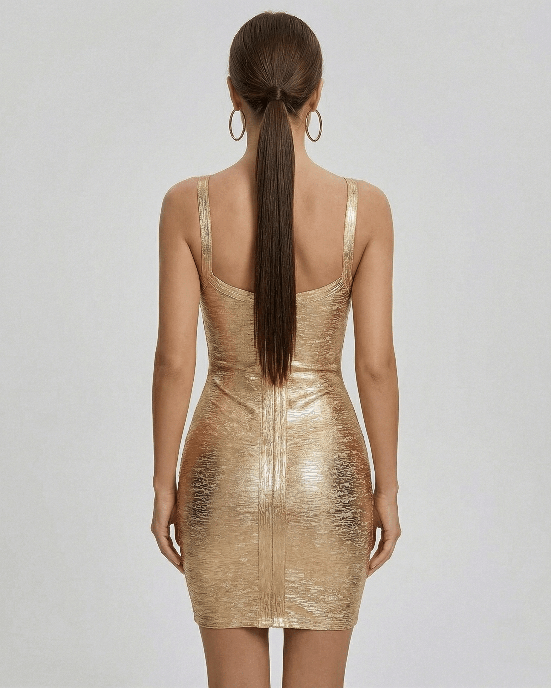 Mave Mini Dress featuring a shimmering gold hue, sleek silhouette, perfect for glamorous occasions by RAMBLION.