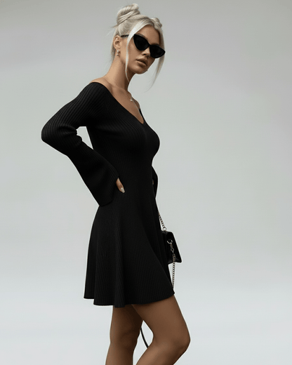 Maya Mini Dress by RAMBLION, black cotton A-line, V neck, stylish and comfortable for any occasion.