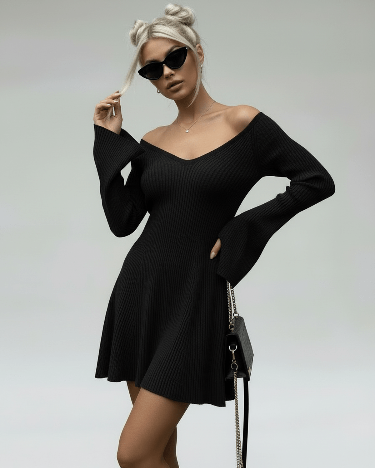 Maya Mini Dress by RAMBLION, black V-neck A-line dress, stylish and versatile for any occasion.