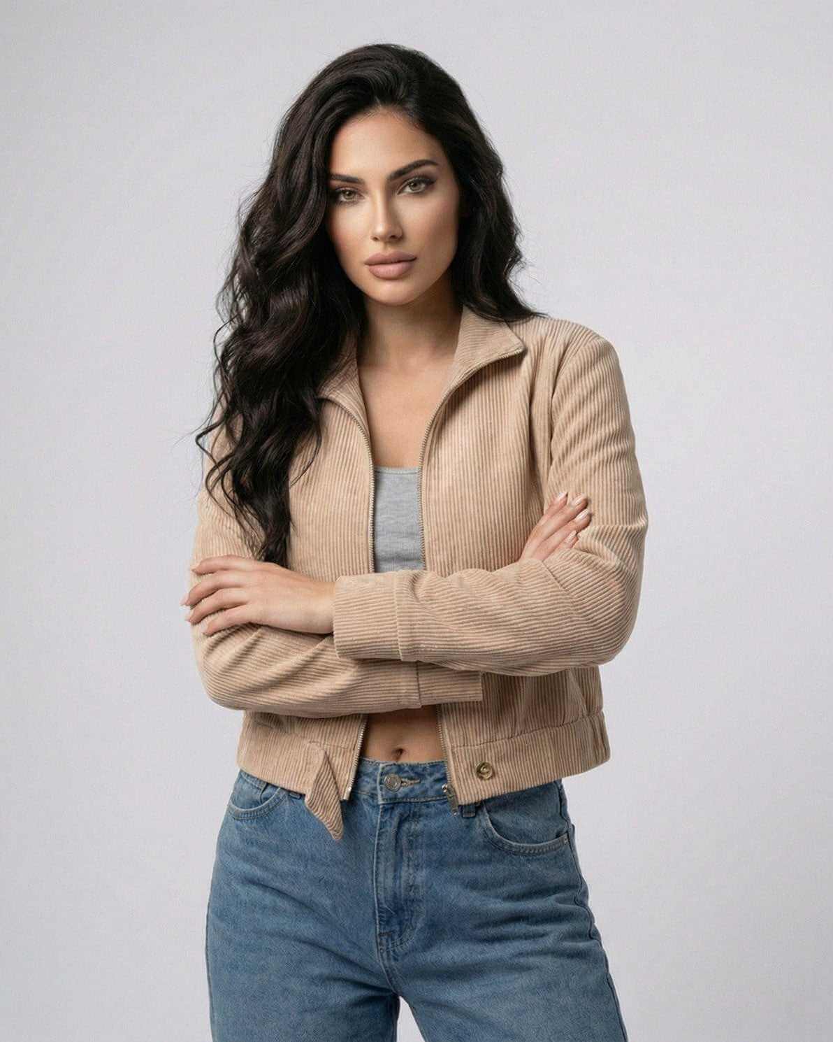 Model wearing the Meva Jacket, a lightweight beige jacket, perfect for everyday style by RAMBLION.