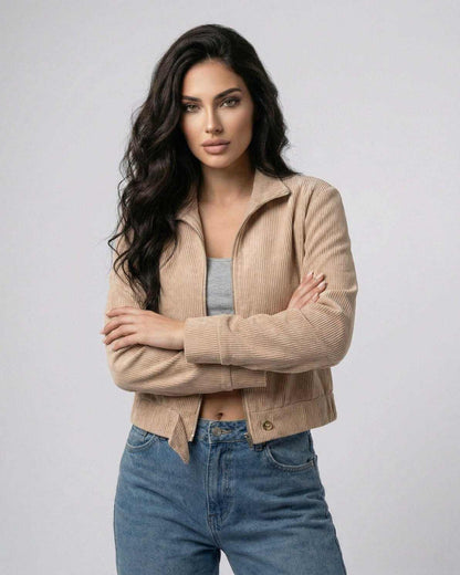Model wearing the Meva Jacket, a lightweight beige jacket, perfect for everyday style by RAMBLION.