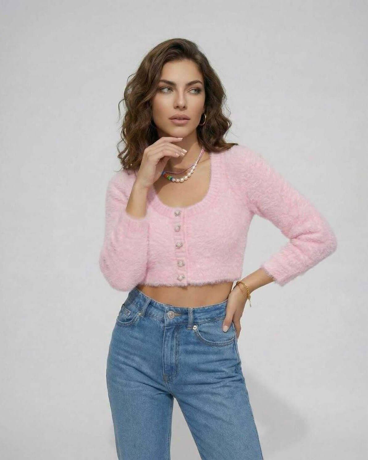 Moiré Cardigan by RAMBLION in soft pink, featuring plush texture and stylish silhouette, perfect for modern femininity.
