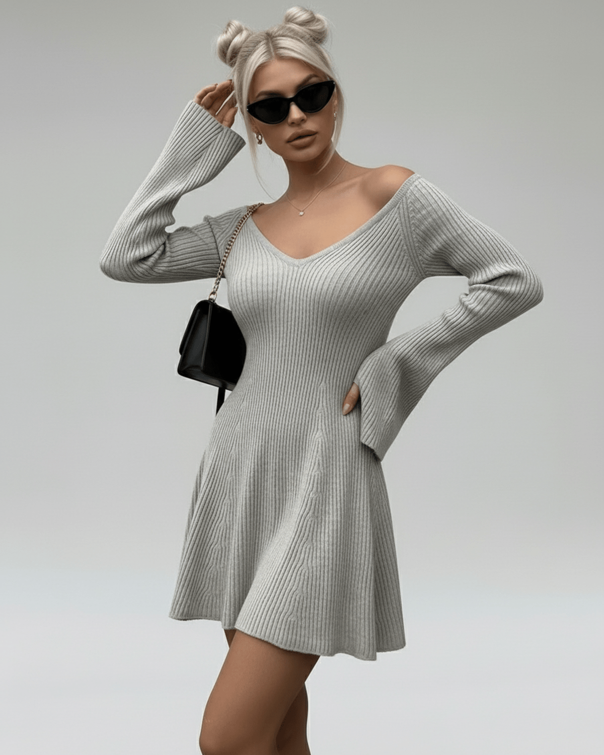 Naib Mini Dress in grey knit, V-neck style, perfect for casual outings, featuring comfort and elegance by RAMBLION.