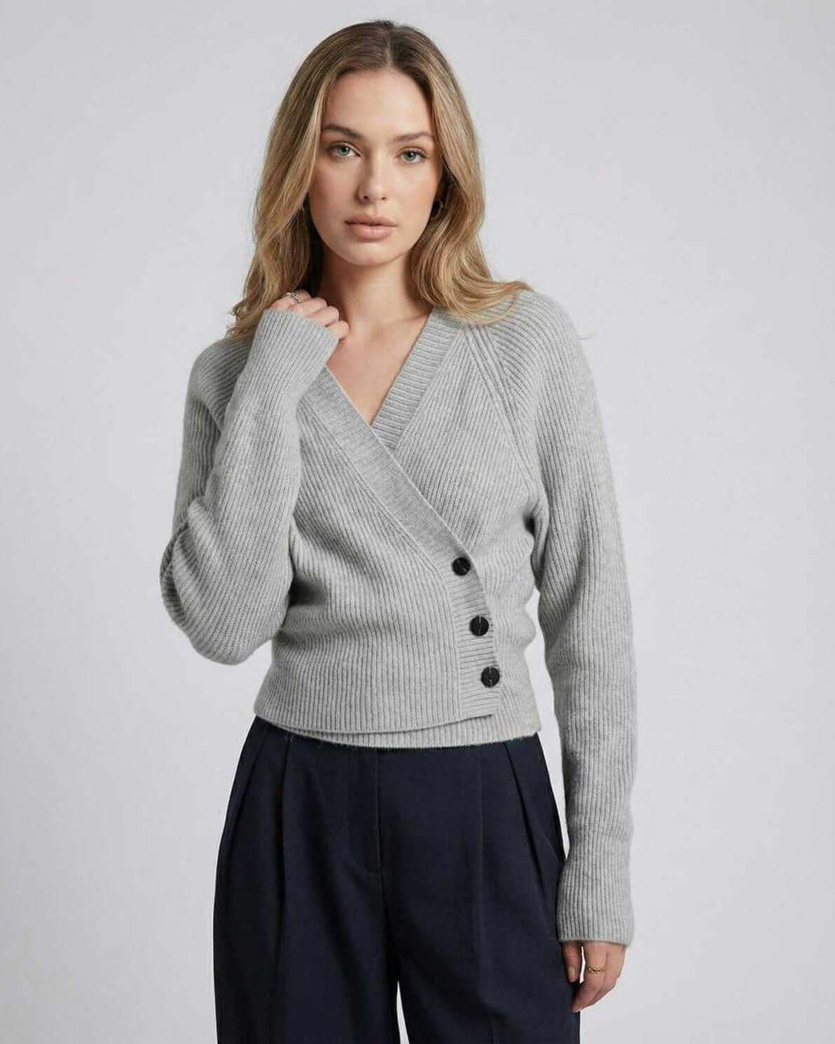 Naif Sweater in grey with V-neck, long sleeves, structured ribbed texture by RAMBLION, perfect for stylish comfort.