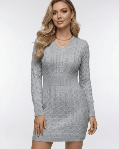 Nimbus Mini Dress in soft gray cable knit with V-neck and elastic waist, perfect for a refined, comfortable fit.