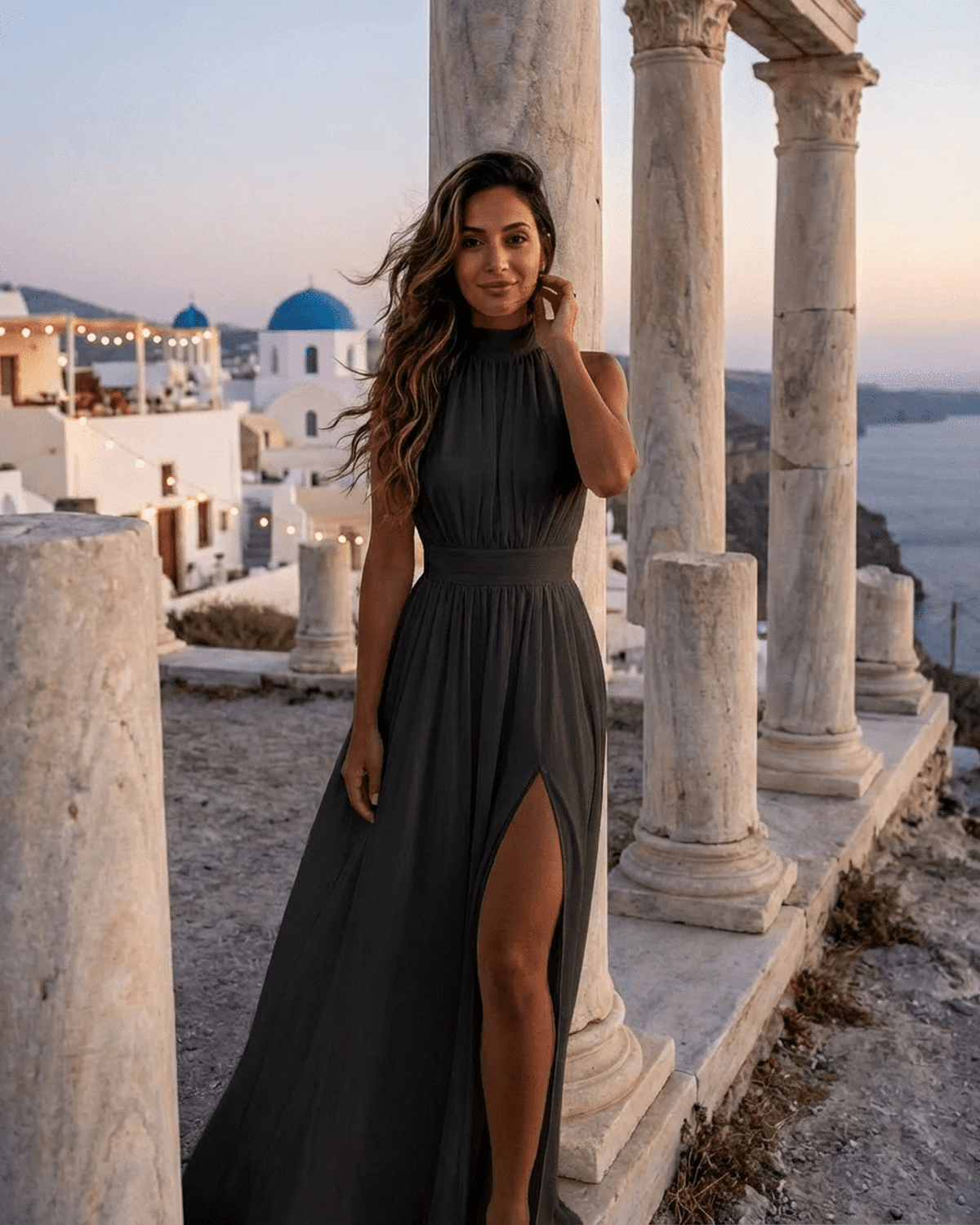 Elegant Noctis Maxi Dress with side slit, sleeveless turtleneck design showcased against a scenic backdrop.
