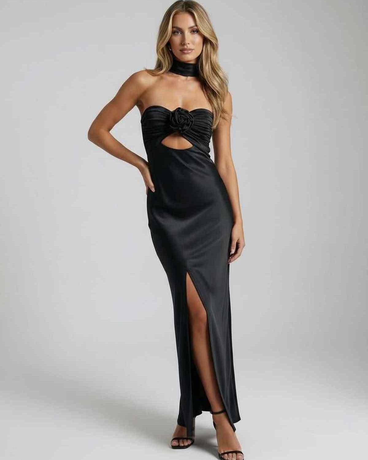 Noir Maxi Dress - Elegant black satin fit and flare gown with strapless neckline and rose detail.