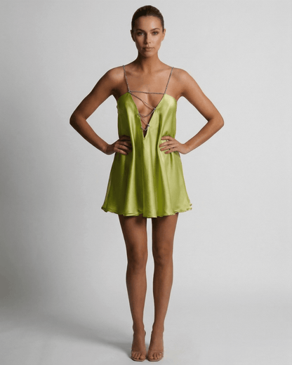 Nyra Mini Dress in vibrant green satin, featuring V neck and A-line silhouette, perfect for summer style - RAMBLION
