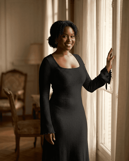 Woman wearing RAMBLION Nyx Maxi Dress with square neckline and long sleeves, showcasing a ribbed knit texture.