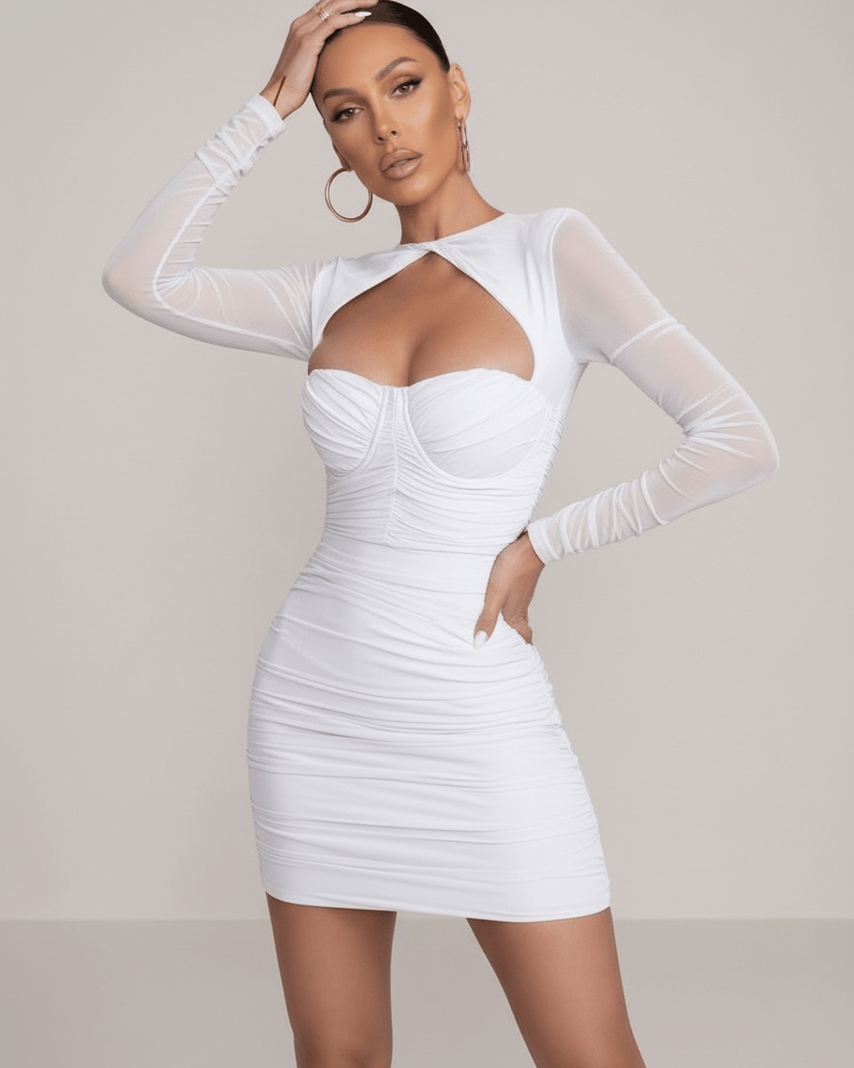 Onii Mini Dress by RAMBLION, white sheath dress with sweetheart neckline and sheer long sleeves, perfect for spring and summer events.