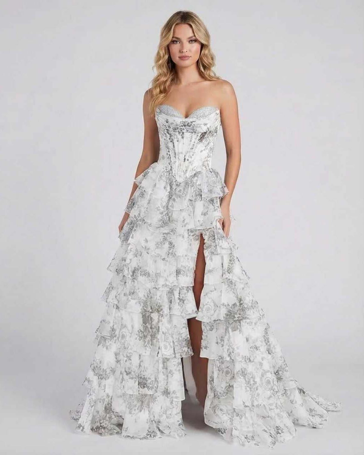 Ora Maxi Dress by RAMBLION, strapless silver gown with tiered ruffles, elegant with high slit, perfect for special occasions.