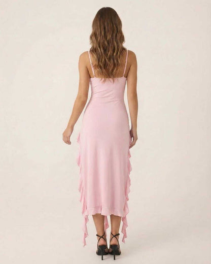 Peda Midi Dress in soft pink, back view showing ruffle trim, V-neckline, perfect for elegant occasions by RAMBLION.