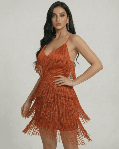 Peda Mini Dress by RAMBLION, vibrant orange with fringe, perfect for standout moments and special occasions.