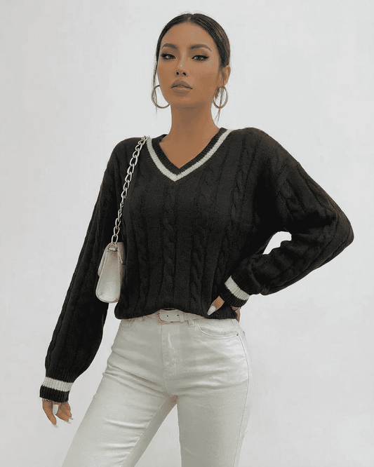 Pia Sweater from RAMBLION, black cable knit, V-neck design, soft polyester, stylish for various occasions.