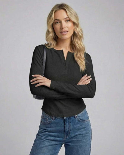 Positano Top black mini dress with long sleeves, waffle knit fabric by RAMBLION, perfect for stylish comfort on various occasions.