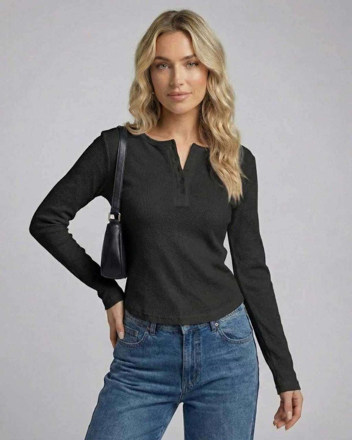 Positano Top by RAMBLION, black mini dress, textured waffle knit, cozy feel, perfect for various occasions.