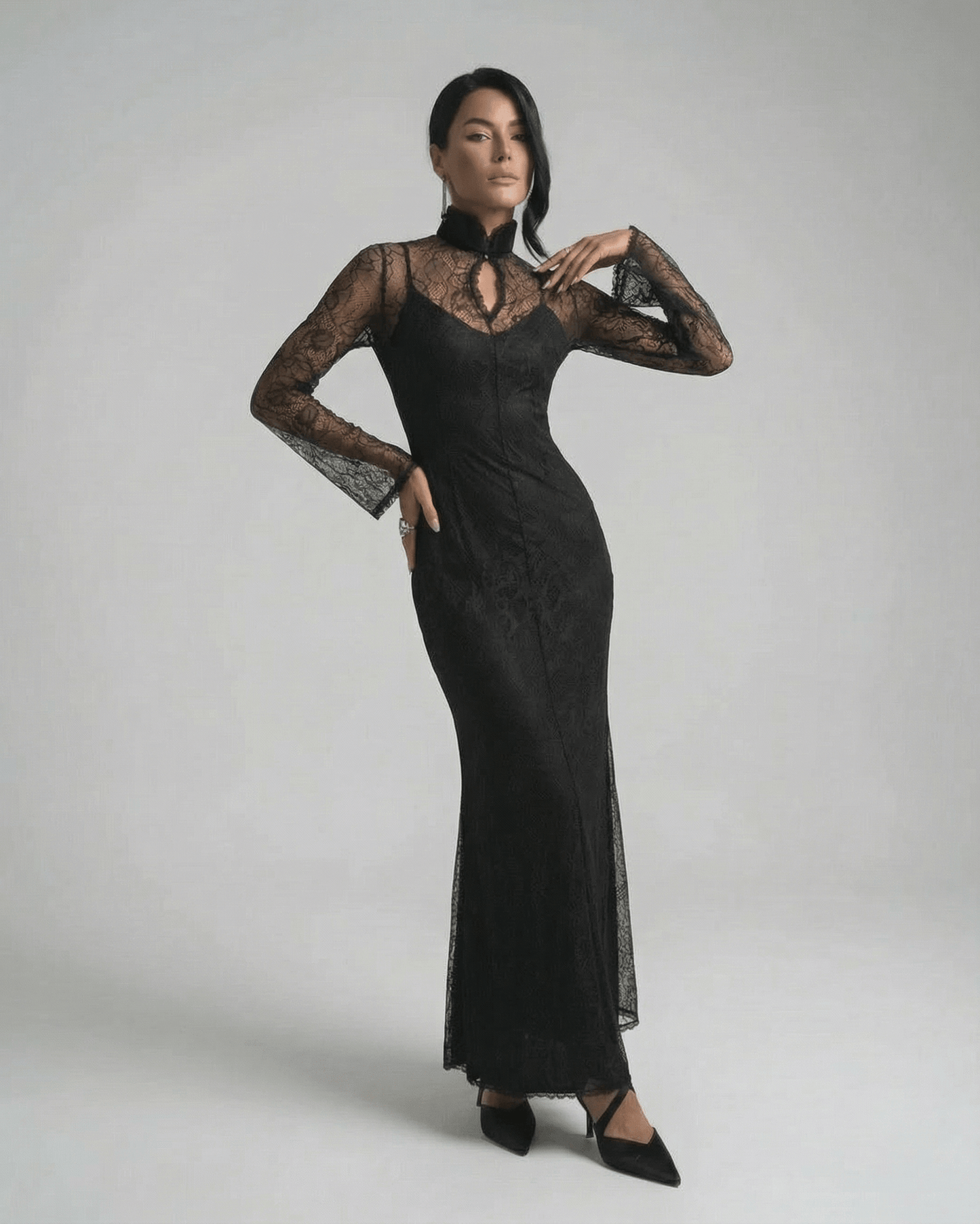 Raia Maxi Dress in black lace, ankle-length with round neck; elegant and sophisticated from RAMBLION, perfect for special occasions.