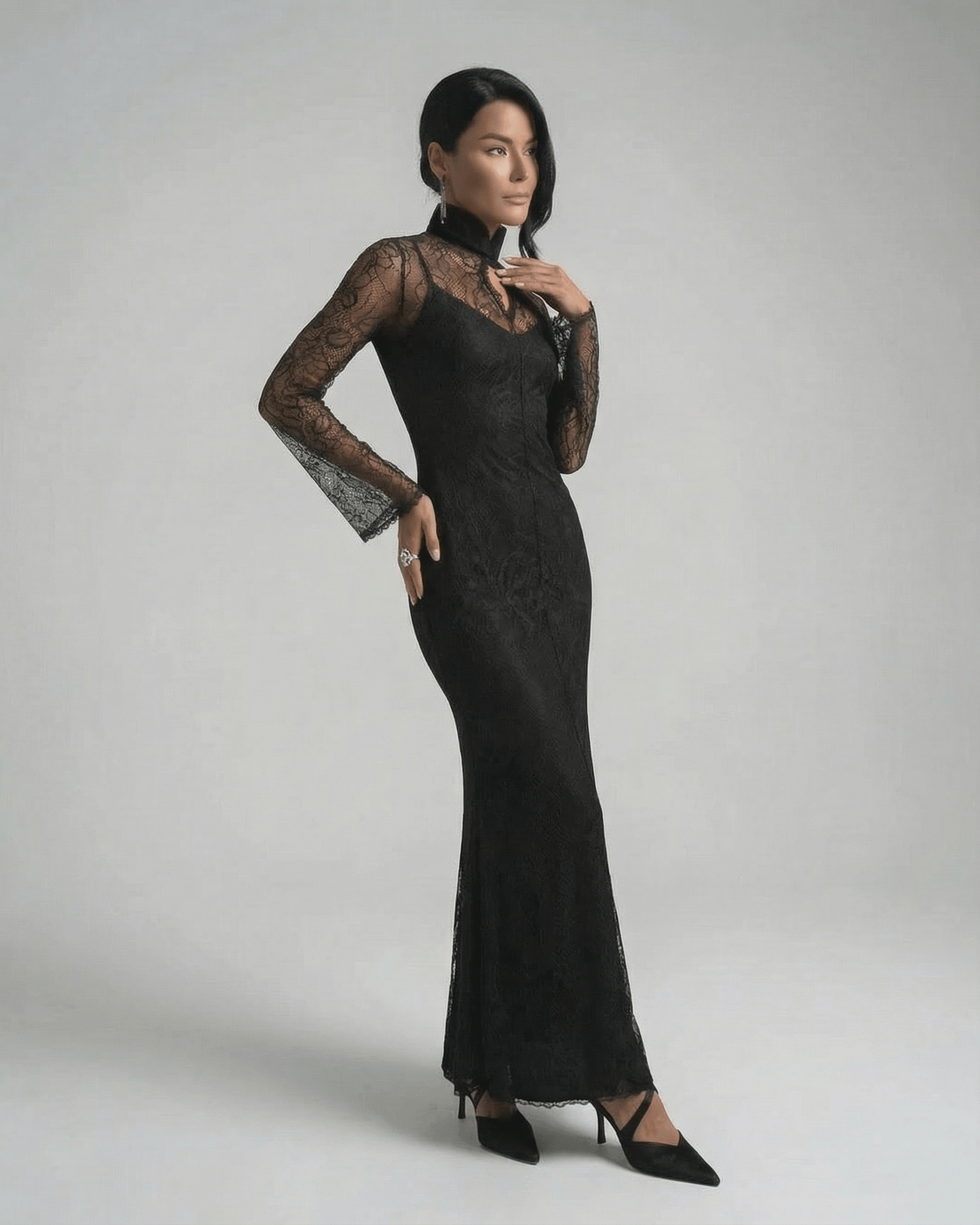 Raia Maxi Dress in black lace featuring round neck and elegant floor-length silhouette by RAMBLION.