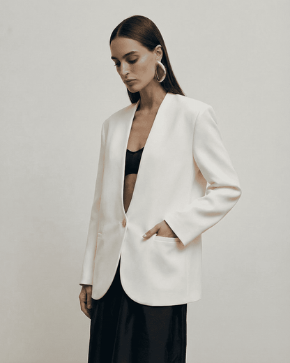 Rala Blazer by RAMBLION, tailored white blazer with V neck, stylish and comfortable for modern occasions.